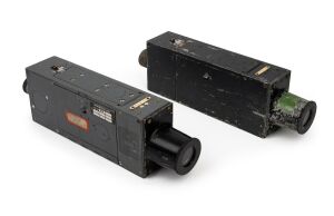 WILLIAMSON: Two c. 1940s "Short Lens" Type G.45 aircraft gun cameras [#11557 & #57924M], one with British Air Ministry logo; these cameras were extensively used by British and Commonwealth air forces (Spitfire/Mustang) to record aerial combat during the S