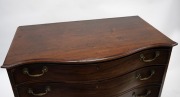 A fine quality antique George III mahogany serpentine front graduated chest of four drawers with cock-beaded decoration, Chippendale style escutcheons, each drawer fitted with unusual military style lock-in bail handles, the cantered corners inlaid with t - 2