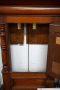 An antique Welsh mahogany longcase clock, signed "P. D. Pierce, Pwllheli". Decorated with recessed arcaded panels and turned columns either side of the small trunk door, swan neck pedament to the sliding hood with fully turned and split column decoration - 4