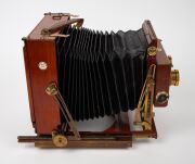 THORNTON-PICKARD: "Special Ruby" view camera [#530047], late-19th century, plate dimensions 12 x 16.5cm, twin Thornton-Pickard Beck Symmetrical lenses, Thornton-Pickard stereo roller-blind shutter, "Baker & Rouse" retailer's inlay. - 3