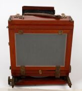 THORNTON-PICKARD: "Special Ruby" view camera [#530047], late-19th century, plate dimensions 12 x 16.5cm, twin Thornton-Pickard Beck Symmetrical lenses, Thornton-Pickard stereo roller-blind shutter, "Baker & Rouse" retailer's inlay. - 4