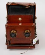 THORNTON-PICKARD: "Special Ruby" view camera [#530047], late-19th century, plate dimensions 12 x 16.5cm, twin Thornton-Pickard Beck Symmetrical lenses, Thornton-Pickard stereo roller-blind shutter, "Baker & Rouse" retailer's inlay. - 6