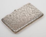 A fine quality antique Continental silver case with engraved floral decoration and cabochon emerald clasp, circa 1900, 7.5cm wide, 55 grams total. - 2