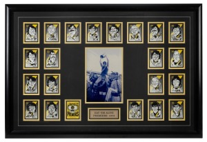 RICHMOND 1973 PREMIERSHIP: "Eat 'em Alive" display incorporating one photograph and a complete set of twenty-one WEG trading cards, each signed by the respective player; signatories include Kevin Bartlett, Tom Hafey, Royce Hart, Rex Hunt, Kevin Sheedy, Ian Stewart, and others; attractively framed and glazed, 106 x 71cm overall.