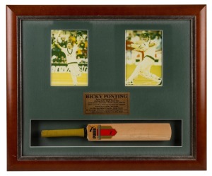 RICKY PONTING: Signature on miniature cricket bat, mounted in display case with two action photographs and career statistics; CoA present, 49 x 58cm overall.