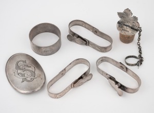 Antique Australian silver napkin rings, belt buckle and bottle stopper, makers include ROWLAND and LEVINSON, 19th/20th century, (6 items), 155 grams total including the cork.