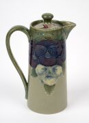MOORCROFT rare and early "Pansy" pattern teapot and companion hot water pot on celadon green ground, (2 items), both impressed "MOORCROFT BURSLEM" with green signature "W. Moorcroft", ​​​​​​​15.5cm high. - 9
