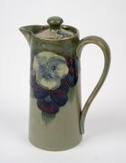 MOORCROFT rare and early "Pansy" pattern teapot and companion hot water pot on celadon green ground, (2 items), both impressed "MOORCROFT BURSLEM" with green signature "W. Moorcroft", ​​​​​​​15.5cm high. - 11