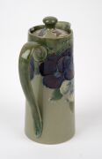 MOORCROFT rare and early "Pansy" pattern teapot and companion hot water pot on celadon green ground, (2 items), both impressed "MOORCROFT BURSLEM" with green signature "W. Moorcroft", ​​​​​​​15.5cm high. - 12
