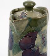 MOORCROFT rare and early "Pansy" pattern teapot and companion hot water pot on celadon green ground, (2 items), both impressed "MOORCROFT BURSLEM" with green signature "W. Moorcroft", ​​​​​​​15.5cm high. - 13