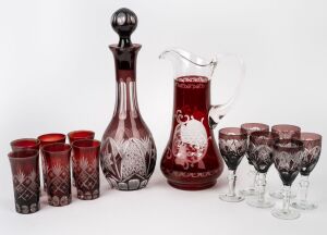 Two vintage Bohemian overlay glass drink sets, 20th century, (14 items), the decanter 34cm high.