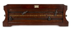 A mid-20th century wall-mounted billiards scoreboard by Albert Monkhouse, Oldham; hand-painted number track with original sliding score markers; dimensions 21 x 61cm.