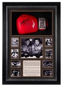 MUHAMMAD ALI v JOE FRAZIER: An "Everlasting" boxing glove signed by both Ali and Frazier, in display case with photographs and texts recounting the pair's boxing rivalry; CoA present; dimensions 70 x 49 x 15cm.