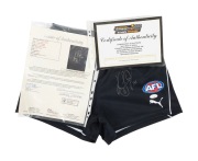 KADE SIMPSON - CARLTON 300 CLUB: A pair of Carlton AFL ON-Field Team Gear football shorts, signed by Kade Simpson with "342" the number of his appearances for the club written next to his signature. With two Certificates of Authenticity. - 2