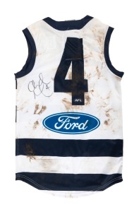 GEELONG: A Round 10, 2011 Geelong match worn no.4 jumper, signed by Andrew Mackie; with A-Tag Certificate of Authenticity. Mackie appeared in 22 games for the club in 2011 during which year he achieved his 150th game and played in the Grand Final, which Geelong won, defeating Collingwood by 38 points. It was Mackie's 3rd Premiership win.