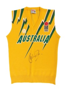 SHANE WARNE'S MATCH WORN 1993/94 ICC WORLD SERIES AUSTRALIAN TEAM VEST The pure wool vest made by Silver Fleece Knitwear, bears the "World Series" wicket and ball logo at left and the Australian Pure New Wool logo at right; "AUSTRALIA" appliqued to front; with Warne's iconic original signature below in felt-tipped pen.