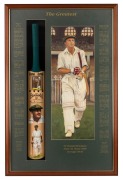 DON BRADMAN: Framed and glazed display titled "The Greatest", comprising full-size Sykes commemorative Bradman bat with attached trading card featuring Bradman's original signature in permanent marker, together with print of Bradman and detailed enumerati