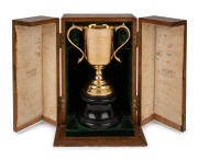 1920 PRINCE OF WALES GOLD CUP: 15ct gold trophy by Hardy Bros, on wooden plinth, offered with original oak case, engraved "Australian Jockey Club/Winter Meeting/In Honour of H.R.H. The Prince of Wales/19th June 1920...