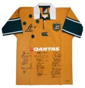 WALLABIES: Circa 2004 official commemorative short-sleeved rugby jumper, player edition [#PL249] issued to Eddie Jones, with twenty-three original signatures including those of George Gregan, George Smith, Eddie Jones, Stephen Larkham, Stirling Mortlock, 