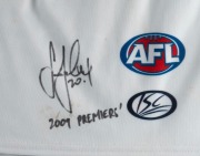 THE 2009 GRAND FINAL - GEELONG 12.8.80 defeated ST.KILDA 9.14.68 A match-worn pair of shorts, signed and endorsed by STEVE JOHNSON. Attractively framed & glazed. Overall 65 x 76cm. - 2