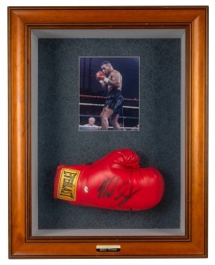 MIKE TYSON: A timber display case comprising a signed photograph and "Everlast" glove, with plaque at base engraved "Iron - Mike Tyson"; two CoAs present; dimensions 74 x 57 x 17cm.
