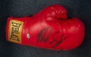MIKE TYSON: A timber display case comprising a signed photograph and "Everlast" glove, with plaque at base engraved "Iron - Mike Tyson"; two CoAs present; dimensions 74 x 57 x 17cm. - 3