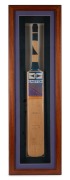 THE TOYOTA VIENTA V6 "BRADMAN" MATCH: A fully-signed souvenir programme with twenty-four original signatures, and a fully-signed bat, attractively framed and glazed, but with quite a few of the signatures faded; dimensions 108 x 33cm. (2 items) - 3