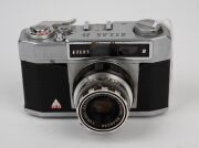 RANGEFINDER CAMERAS: Circa 1950s group comprising Braun Paxette (2), Braun Super Paxette, Okaya Optic Lord IVA, Sanei Samoca-35, and Yamato Atlas 35 II. (6 items) - 2