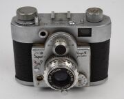 RANGEFINDER CAMERAS: Circa 1950s group comprising Braun Paxette (2), Braun Super Paxette, Okaya Optic Lord IVA, Sanei Samoca-35, and Yamato Atlas 35 II. (6 items) - 6