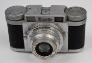 RANGEFINDER CAMERAS: Circa 1950s group comprising Braun Paxette (2), Braun Super Paxette, Okaya Optic Lord IVA, Sanei Samoca-35, and Yamato Atlas 35 II. (6 items) - 10