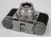 RANGEFINDER CAMERAS: Circa 1950s group comprising Braun Paxette (2), Braun Super Paxette, Okaya Optic Lord IVA, Sanei Samoca-35, and Yamato Atlas 35 II. (6 items) - 11