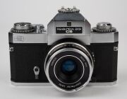ZEISS IKON: Group comprising c. 1950 Contessa 533/24 (Tessar 45mm f2.8/Synchro Compur; with matching leather case), c. 1956 Contina 527/24 (Novicar-Anastigmat 45mm f2.8/Prontor-SVS), c. 1965 Contessa SLK (Tessar 50mm f2.8/Prontor SLK Spezial), and c. 1966 - 4