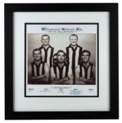 COLLINGWOOD: A collection of twenty-seven button badges (condition issues) nailed on to a display board; players include Peter Daicos, Tony Shaw, and Leigh Matthews; together with a signed timber Magpies mascot display (height 87cm), and one other. (3 ite - 4