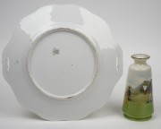 GOLF CERAMICS: An early-20th century plate and vase by Schwarzburg, both featuring polychrome transfers after artworks by Michael Brown; the plate 24.5cm wide and stamped "Schwarzburg" to the base; the vase 13cm tall. (2 items) - 2