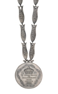 1962 PERTH COMMONWEALTH GAMES: Silver winner's medal by K.G. Luke, text on obverse "1962 VII British Empire And Commonwealth Games/Perth/Western Australia", engraved on reverse "Athletics/Women/Javelin Throw/R. Morgan/England", offered in original presentation case featuring BE&CG crest; medal diameter 58mm, maximum length incl. chain 47.5cm, weight approx. 160g.