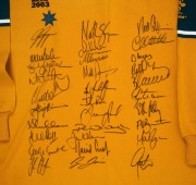 WALLABIES - 2003 WORLD CUP: Official commemorative long-sleeved rugby jumper, issued to coach Eddie Jones, with thirty-one original signatures including those of George Gregan, Stephen Larkham, George Smith, and Eddie Jones; size 2XL. - 2