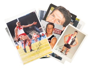 TONY LOCKETT: A group of photographs signed by Lockett, together with signatures of Nicky Winmar, Robert Harvey, Nathan Bourke, and others. (15 items)