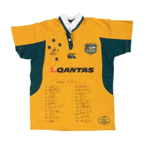 WALLABIES: Circa 2007 official commemorative short-sleeved rugby jumper, player edition [#PL583], with twenty-three original signatures including those of Stirling Mortlock, George Gregan, George Smith, and John Connolly; size M.