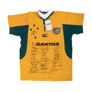 WALLABIES: Circa 2006 official commemorative short-sleeved rugby jumper, player edition [#PL609], with twenty-seven original signatures including those of George Smith, Stirling Mortlock, Matt Giteau, George Gregan, Stephen Larkham, and John Connolly; size M.