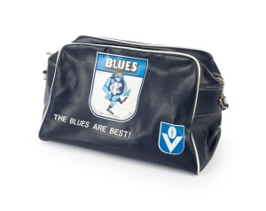 CARLTON: Two rare Blues items - an intact c. 1960s WEG "F35 - The Blues from Carlton" sticker, together with a 1976 Blues zip-up leather carry bag, length 44cm. (2 items)