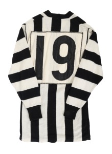 COLLINGWOOD: A late-1970s match-worn long-sleeved guernsey, VFL logo and "Yakka" patches on front, number 19 on back; John Wise, Laurie Sandilands, and Craig Davis wore this number during the seasons when this guernsey configuration was used.