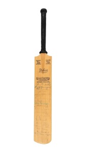 An early-1970s miniature cricket bat bearing eighteen signatures, including those of Ian Chappell, Keith Stackpole, Rod Marsh, Greg Chappell, Bob Massie, Ray Steele, and others.