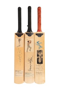 Three full-size "Rapier" cricket bats, signed to the blade by Kim Hughes, Bill Lawry, and Doug Walters respectively, each bearing the relevant player's career statistics; length of each 85cm.
