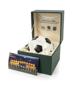 SOCCEROOS: 2006 commemorative ceramic soccer ball, limited edition #107/1000, featuring no fewer than twenty gilt facsimile signatures; offered in original maker's box, dimensions 19 x 19 x 19cm (when closed).