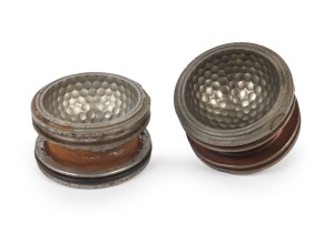 A circa 1930s steel two-piece dimple-pattern golf ball mould; engraved "EX-C447T 6" and "EXC506"; height 6.5cm (when stacked).