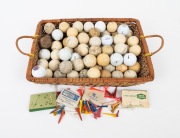 GOLF BALLS: A collection of golf balls, spanning examples from the early-20th through to the 21st century; noted three c. 1920s mesh-pattern types, as well as several c. 1930s early dimple types. (qty.)