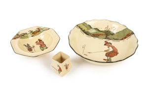 Three various Royal Doulton golfing series pieces: a fruit bowl (D3395), a sweets bowl, and a toothpick holder (D5497). (3 items).