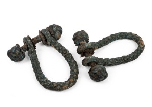 A pair of antique rope and leather maritime beckets with Turkmen knot decoration, 19th century, 21 x 16cm.