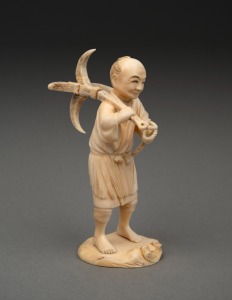An antique Japanese carved ivory okimono of a sailor carrying an anchor, Meiji period, 19th/20th century, ​​​​​​​12cm high.