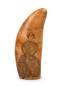 A scrimshaw whale's tooth with full length portrait of a lady, ​​​​​​​12.5cm high.